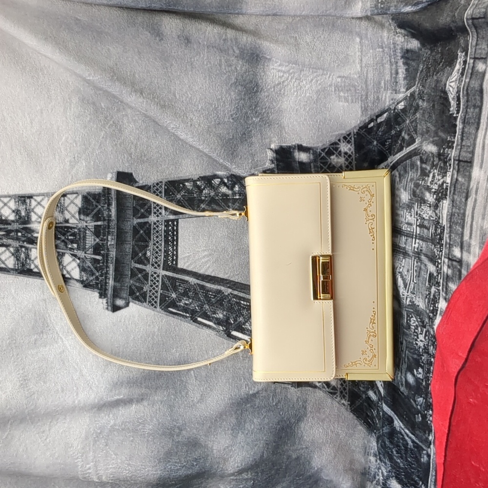 Elegant Cream Shoulder Bag with Gold Accents - Picture 2 of 16